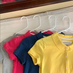 Four pack of Aeropostale women’s “golf” shirts